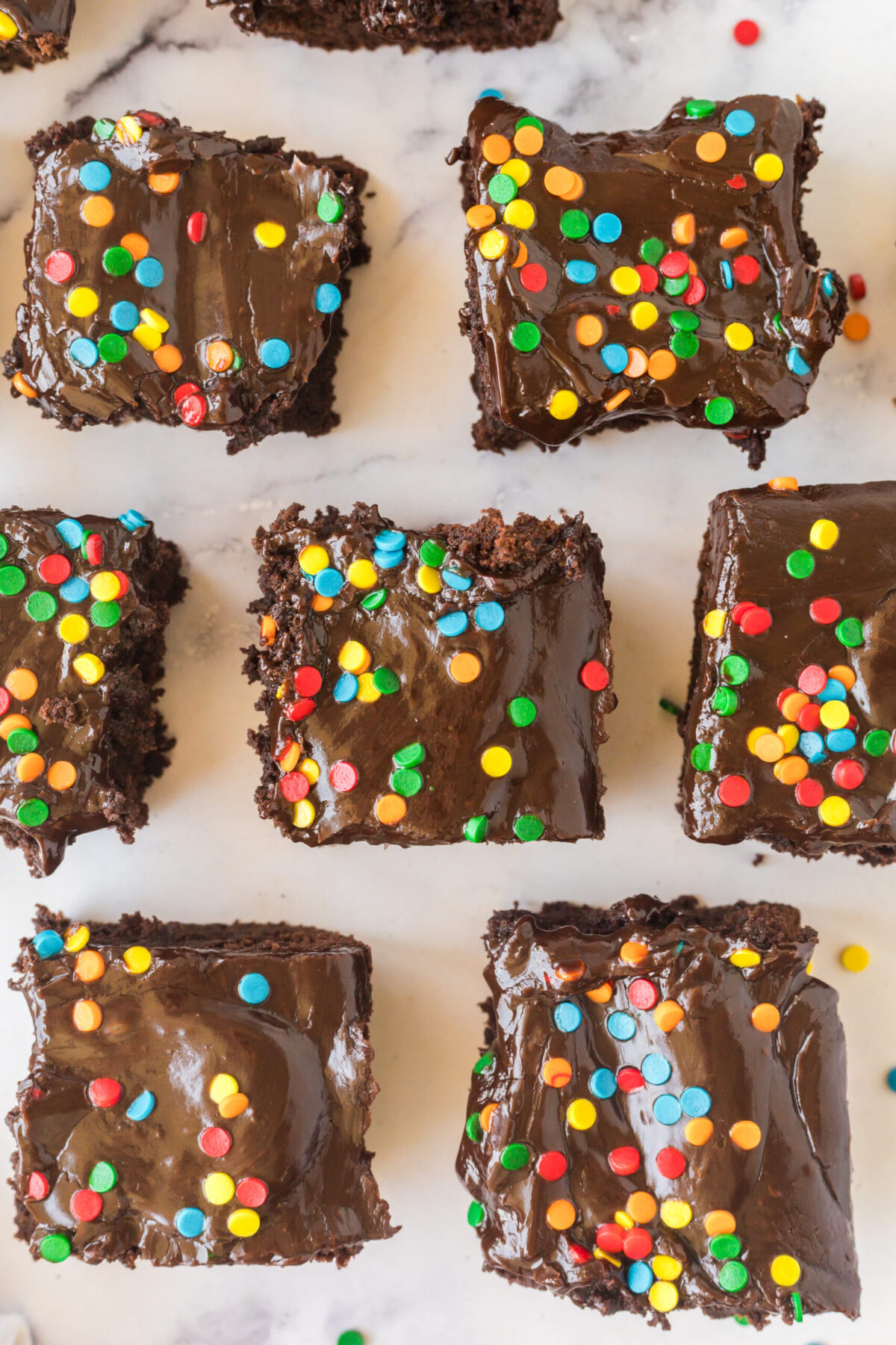 cosmic brownie recipe. Brownie squares on white surface