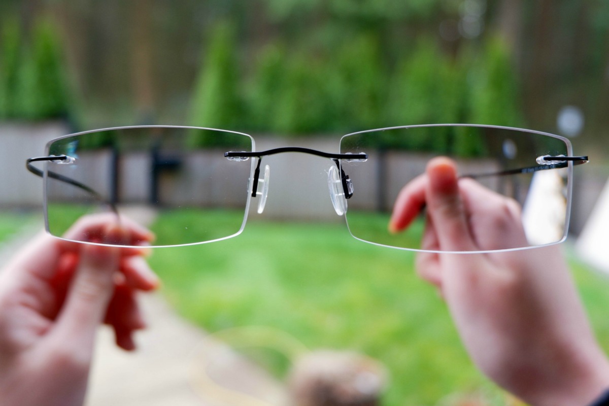 Clearly Rimless Frames outside with transition lenses
