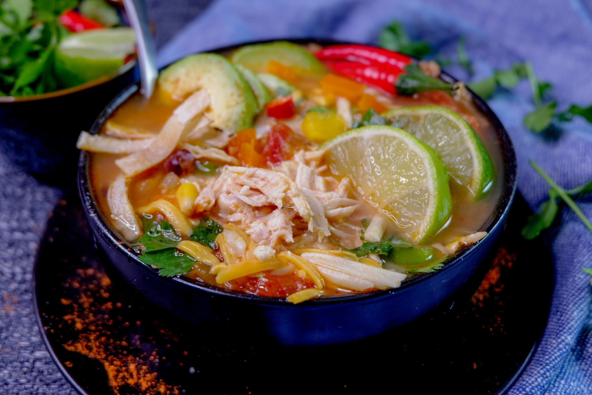 This Instant Pot Chicken Tortilla Soup is a perfect comfort food meal that comes together in minutes using your electric pressure cooker with amazing authentic flavours!