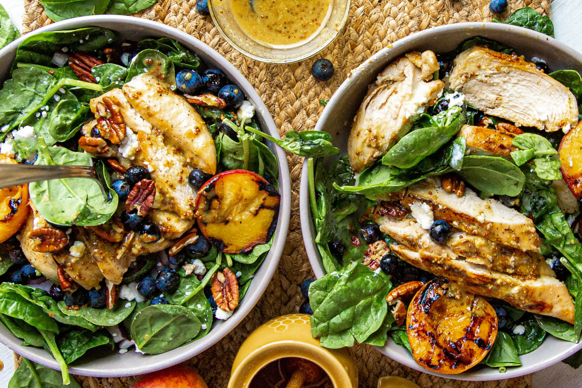 grilled peach salad with grilled chicken two bowls