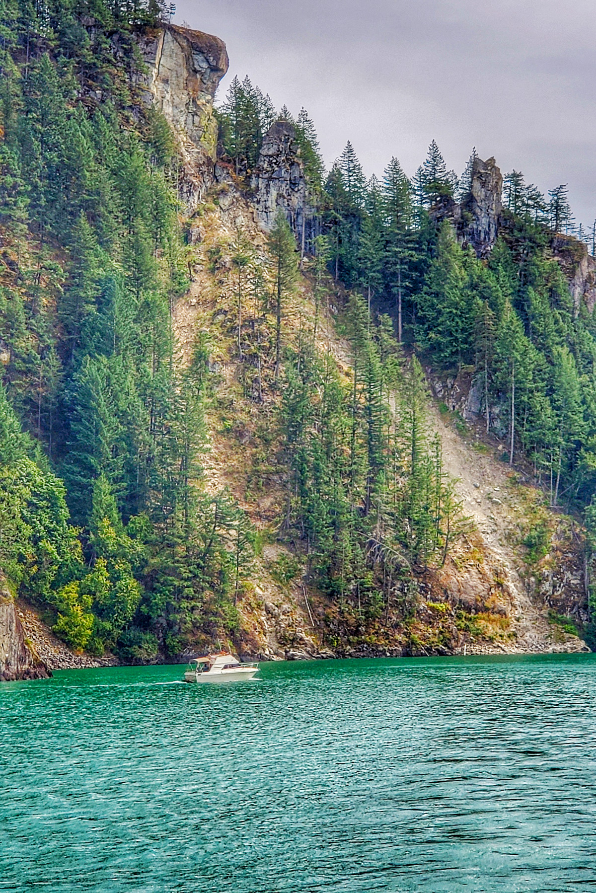 Harrison lake view with cliff and boat