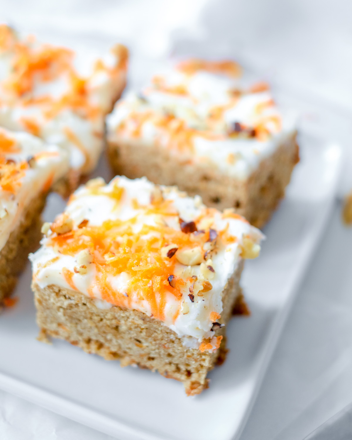 carrot cake blondies squares on a plate