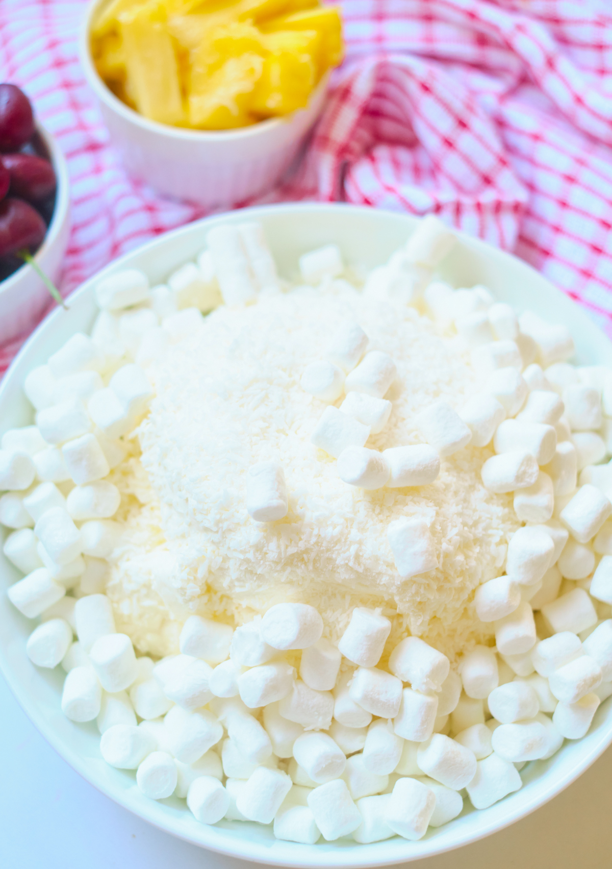 cherry pineapple fluff ingredients of cherries, marshmallows, whipping cream and more