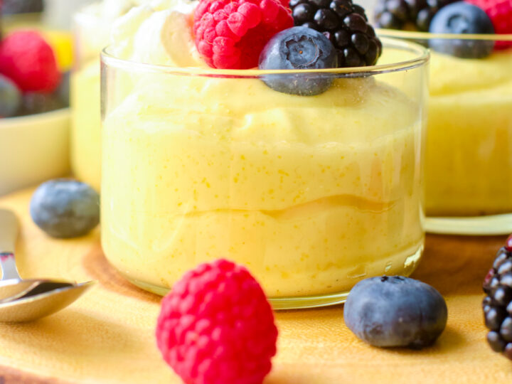 lemon mousse in small round glass mini dessert bowls