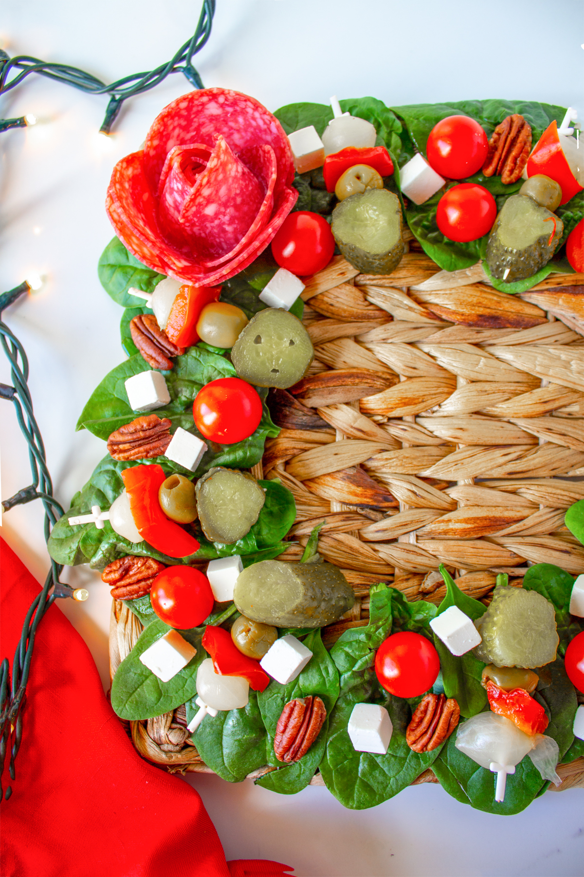 This holiday charcuterie board in the shape of a wreath makes for a beautiful and delicious centerpiece. It's great for any holiday event and you can change out the cheese and meets to suit your needs and taste buds. 