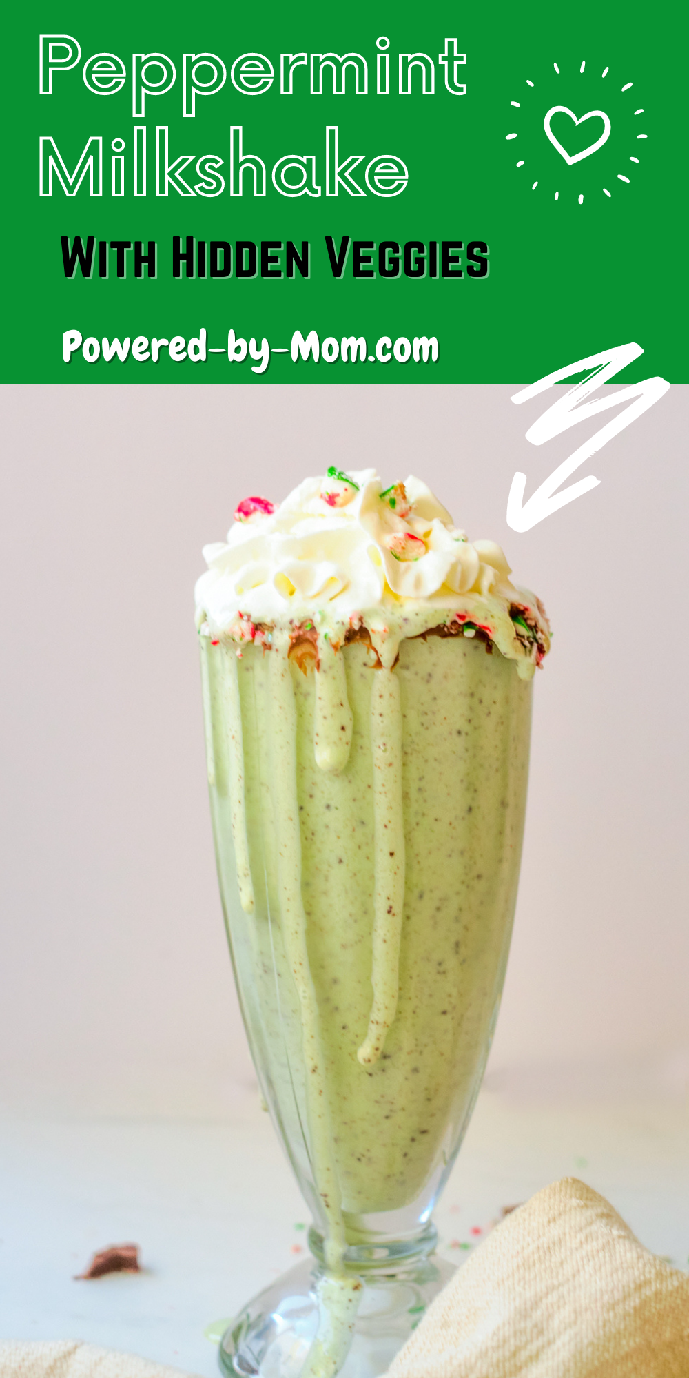 Enjoy this peppermint milkshake with a festive touch of a chocolate-rimmed glass with crushed candy canes with the option of hidden veggies.